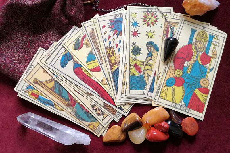 Image of Tarot cards and crystals.